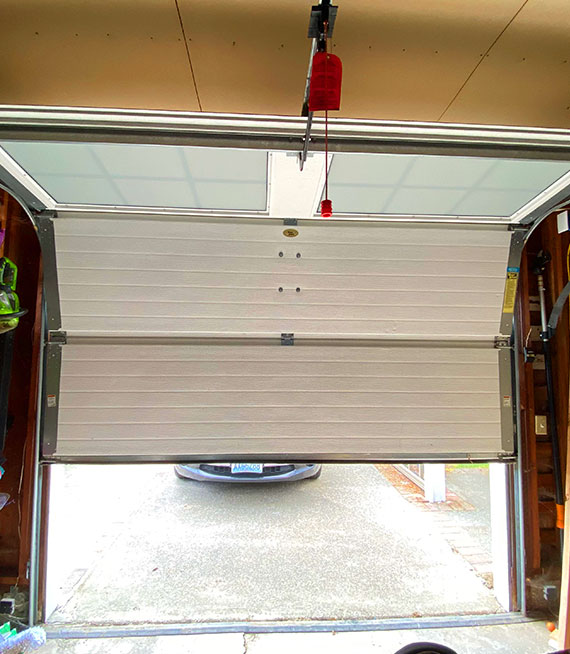 ouverture-porte-de-garage-78270